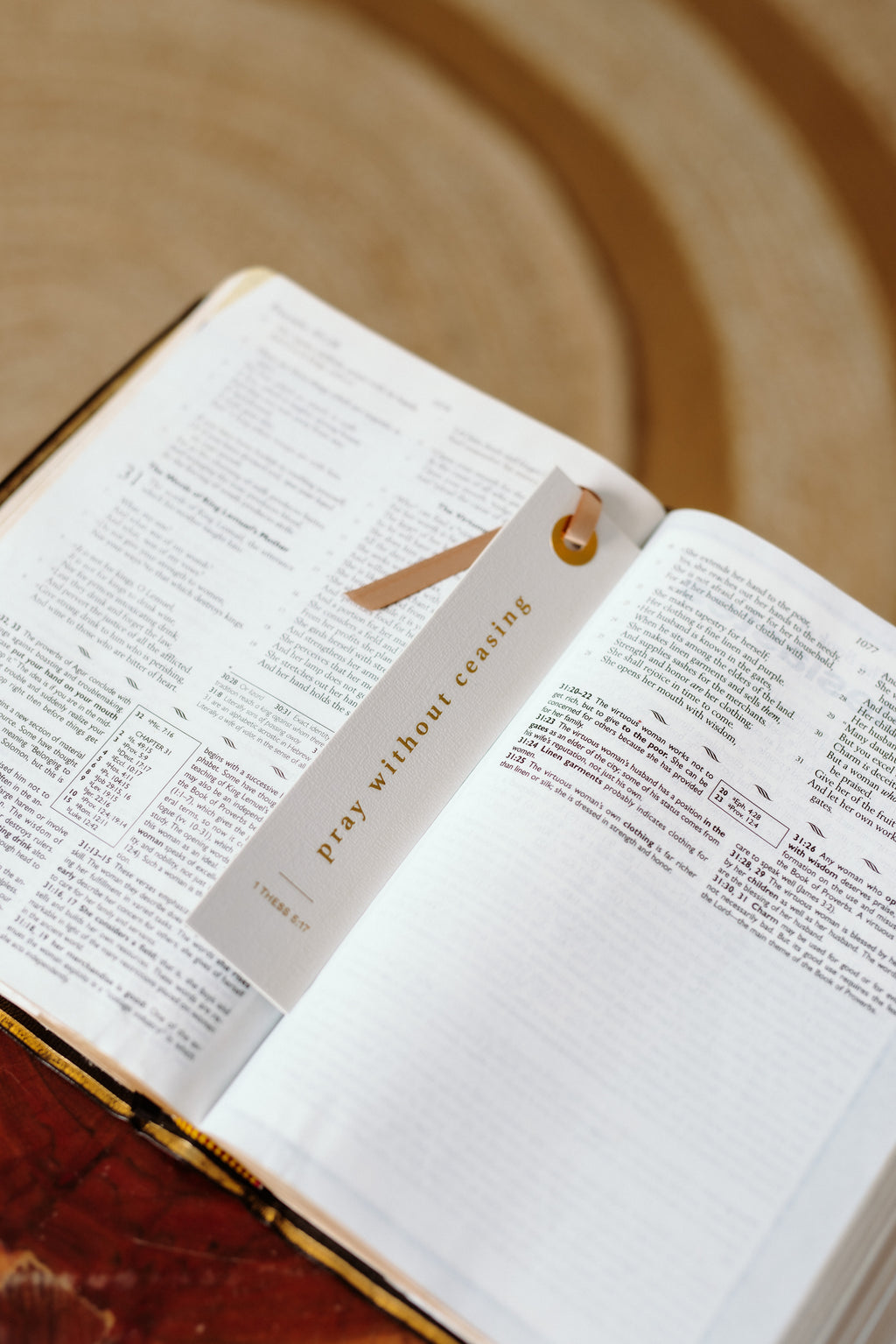 Pray without ceasing bookmark onto of an open bible. 